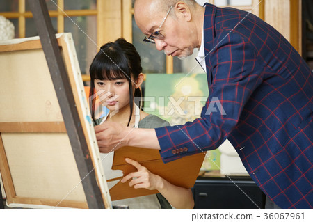 Young and senior drawing a picture 36067961