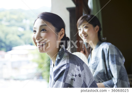Woman enjoying a hot spring trip 36068025