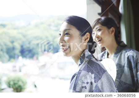 Woman enjoying a hot spring trip Woman enjoying a hot spring trip 36068056