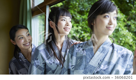 Woman enjoying a hot spring trip 36068201