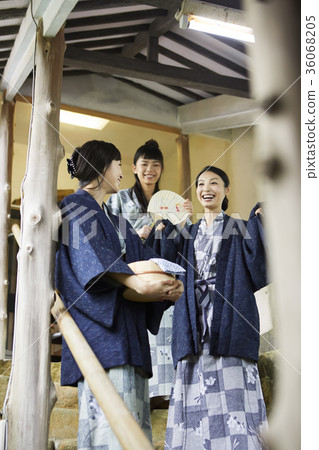 Woman enjoying a hot spring trip 36068205