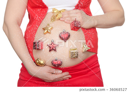 Belly of pregnant woman with beautiful Christmas decorations 36068527