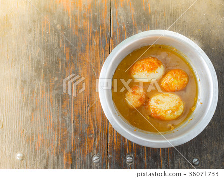 Fried Boiled Egg with Tamarind Sauce, Thai food  36071733