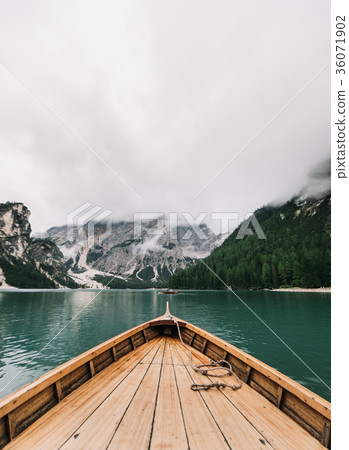 Boats on Lago di Braies mountain lake  36071902