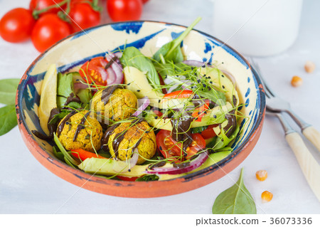 Falafel salad with fresh vegetables Falafel salad with fresh vegetables 36073336
