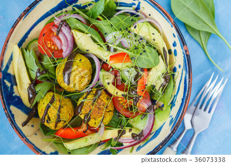 Falafel salad with fresh vegetables Falafel salad with fresh vegetables 36073338