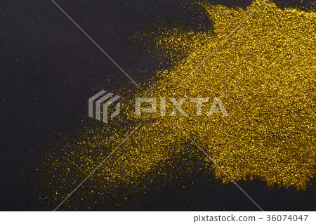 Golden glitter sand texture on black background 36074047