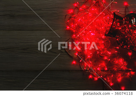 Christmas lights border on wood background Christmas lights border on wood background 36074118
