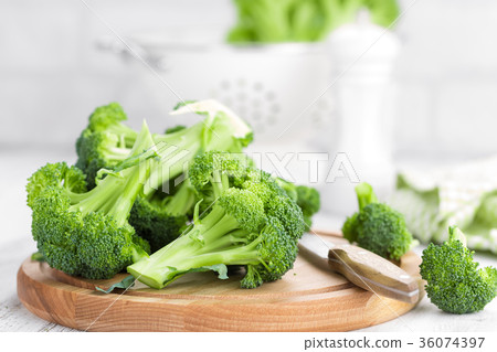 Fresh broccoli on white background closeup Fresh broccoli on white background closeup 36074397