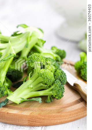 Fresh broccoli on white background closeup Fresh broccoli on white background closeup 36074403
