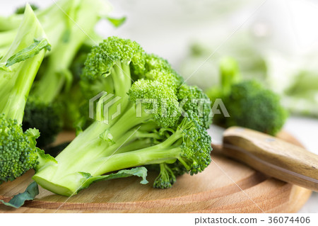 Fresh broccoli on white background closeup Fresh broccoli on white background closeup 36074406