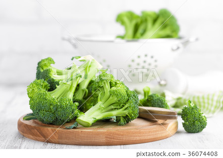 Fresh broccoli on white background closeup Fresh broccoli on white background closeup 36074408