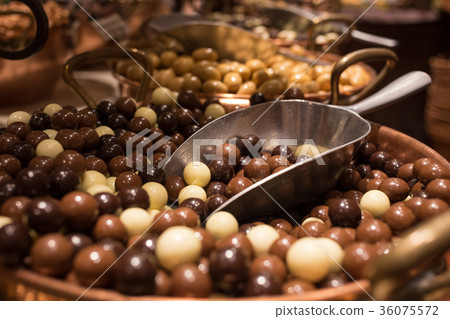 Belgium tasty truffle delicious chocolate in a row 36075572