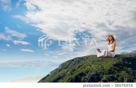 Lady using laptop 36076858