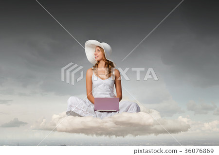 Lady using laptop 36076869