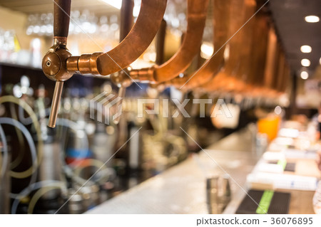 Beer bar pub tap, counter with blur pub background 36076895