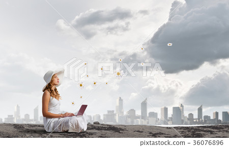 Lady using laptop 36076896