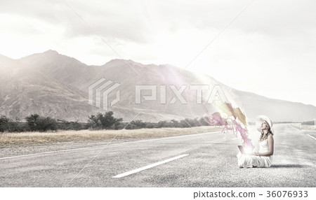Lady using laptop 36076933