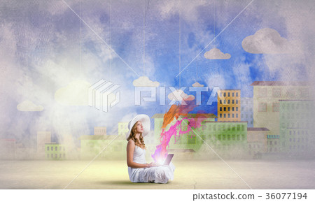 Lady using laptop 36077194