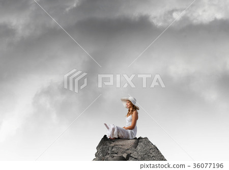 Lady using laptop 36077196