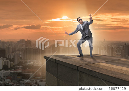 Businessman in uncertainty business concept Businessman in uncertainty business concept 36077429