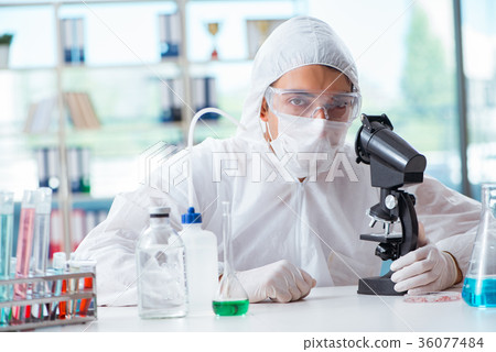 Chemist working in the laboratory with hazardous Chemist working in the laboratory with hazardous 36077484