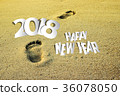 Happy new year for 2018 on the sand background 36078050