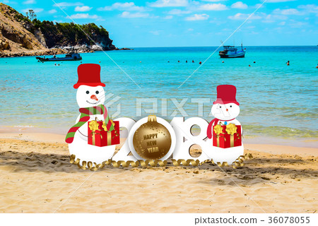 Happy new year for 2018 with snowman on the beach Happy new year for 2018 with snowman on the beach 36078055