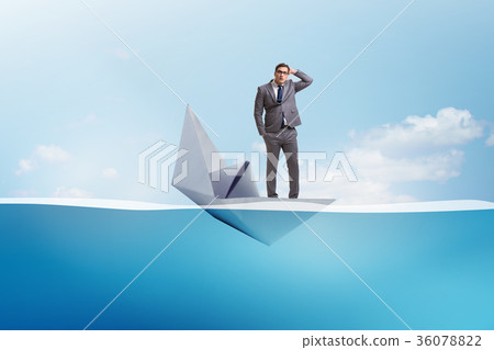 Businessman escaping sunken paper boat ship 36078822