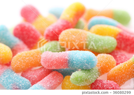 Colorful gummy jelly sugar candies close up isolated in white background 36080299