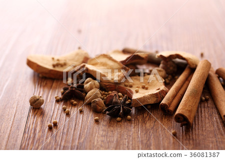 Chinese herbal medicine isolated in wood background 36081387