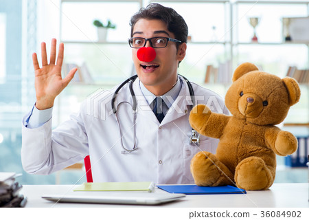 Funny pediatrician with toy in the hospital clinic 36084902