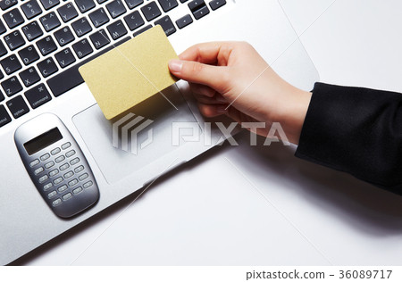 Hands, cards, macbook, calculator Hands, cards, macbook, calculator 36089717