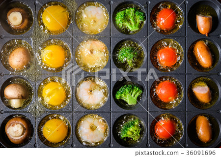 Ajillo on a hot plate 36091696