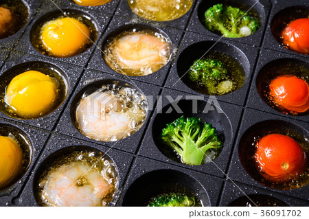 Ajillo on a hot plate 36091702