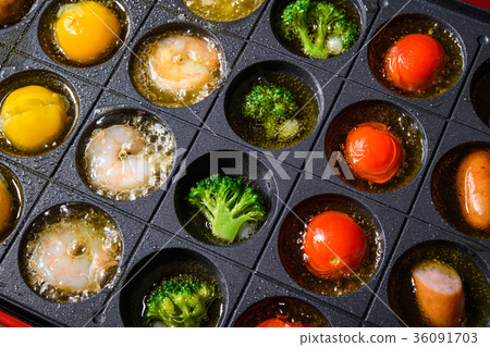 Ajillo on a hot plate 36091703