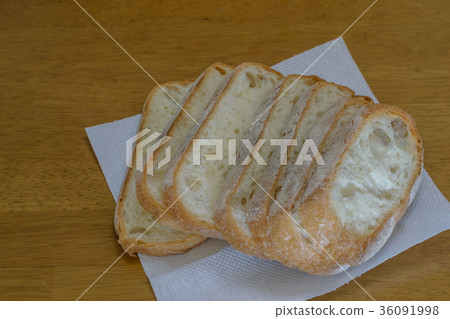 Fresh bread on wooden table Fresh bread on wooden table 36091998