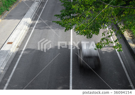 Motion blur of cars over the road Motion blur of cars over the road 36094154