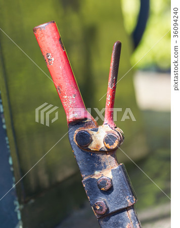 Old hand-operated lever in a train 36094240