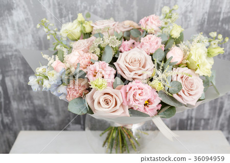 beautiful bouquet of mixed flowers into a vase on beautiful bouquet of mixed flowers into a vase on 36094959