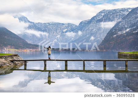 Woman enjoying alpine scenery Woman enjoying alpine scenery 36095028