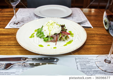 Traditional Italian specialty Burrata Cheese on Traditional Italian specialty Burrata Cheese on 36096677