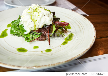 Traditional Italian specialty Burrata Cheese on Traditional Italian specialty Burrata Cheese on 36096678