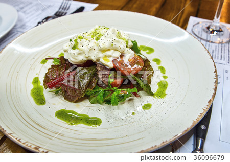 Traditional Italian specialty Burrata Cheese on Traditional Italian specialty Burrata Cheese on 36096679