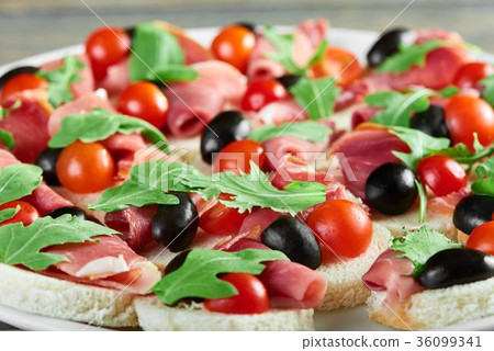 Delicious food on the wooden table 36099341