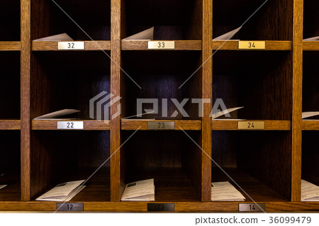Several hotel card in a cabinet 36099479