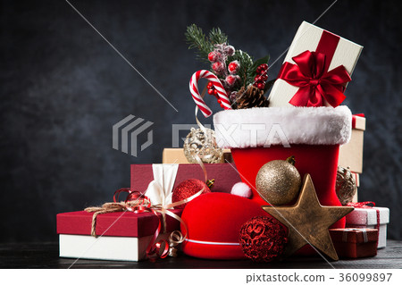Santa's shoe on dark background Santa's shoe on dark background 36099897