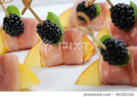 Canape of peach with jamon Canape of peach with jamon 36100198
