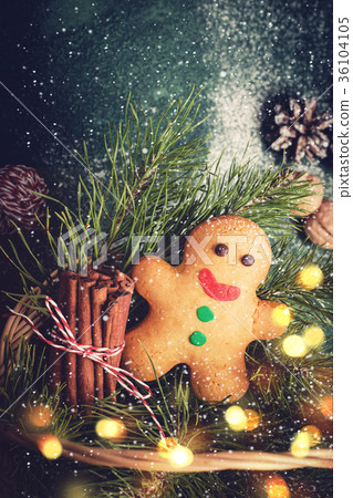 Christmas card with gingerbread man and coniferous 36104105
