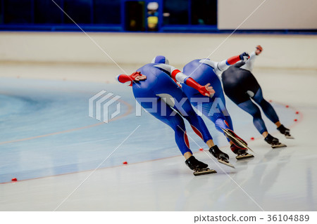 three women athletes speed skaters 36104889